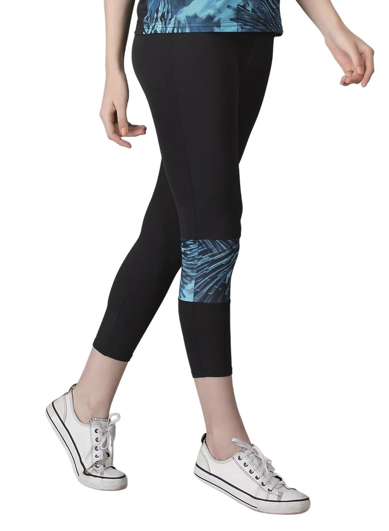 Clovia Green Snug-Fit High-Rise Active Capri Tights in Black with Printed Panel for Women | Best Price UAE